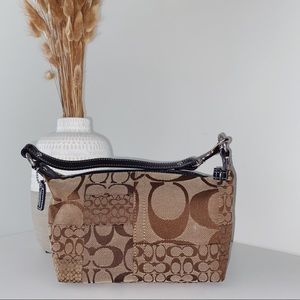 Coach Canvas Handbag with Unique Signature Print